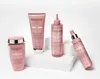 A collection of Kérastase hair products arranged on white pedestals against a white background. Anteprima dell’immagine prodotto