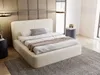 A modern bedroom with a beige upholstered bed, bedside tables, and a rug. Produktbild-Vorschau