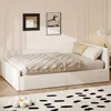 A bedroom scene with a daybed, rug, and wall art. Anteprima dell’immagine prodotto