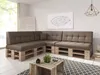A sectional sofa made of wooden pallets with brown cushions in a bright, modern living room. Produktbild-Vorschau