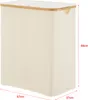 A beige laundry basket with a bamboo lid, shown with dimensions indicated by red lines and text. Produktbild-Vorschau