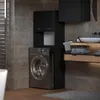 A modern bathroom with a washing machine and a cabinet above it, next to a vanity with a sink. Podgląd zdjęcia produktu