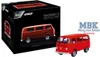A product box for a Revell VW T2 model kit is shown next to the assembled model. The box is black with red accents and features an image of the model. The assembled model is red and is placed to the right of the box. Produktbild-Vorschau
