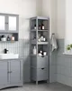 A bathroom scene with a vanity, sink, and a tall storage cabinet. Náhled obrázku produktu