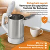 A stainless steel electric kettle with its lid open, next to a mug of coffee on a wooden table. The background is blurred. Anteprima dell’immagine prodotto