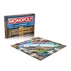 A Monopoly board game box and the game board are displayed on a white background. Produktbild-Vorschau