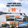 A car with roof racks, showcasing different cargo options like a cargo box, cargo basket, luggage bags, bikes, and a surfboard. Produktbild-Vorschau