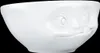 A white ceramic bowl with a face design. Anteprima dell’immagine prodotto