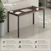A desk in a room setting, with marketing text and icons at the bottom. Produktbild-Vorschau