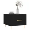 A black bedside table with a gold handle, a cup and saucer, and a vase with dried flowers on top, set against a white background. Produktbild-Vorschau