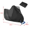 A black motorcycle cover is shown with dimensions indicated. A folded version of the cover is also shown. Produktbild-Vorschau