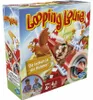 The image shows the colorful packaging of the board game 'Looping Louie', featuring cartoon chickens and a pilot in a plane. Produktbild-Vorschau