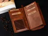An open leather wallet with credit cards inserted, placed next to coffee beans and a magazine. Náhľad obrázku produktu