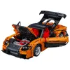 A detailed model of an orange sports car with its hood, doors, and rear spoiler open, revealing the engine and interior. Anteprima dell’immagine prodotto