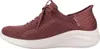 A side view of a red Skechers slip-on sneaker with a white sole. Voir les images du produit