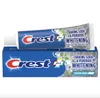 A tube and box of Crest toothpaste. Produktbild-Vorschau