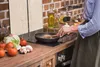 A person cooking in a kitchen. Náhled obrázku produktu