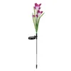 A solar-powered garden light shaped like a flower. Anteprima dell’immagine prodotto