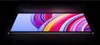 A tablet is shown from a side angle against a dark background, displaying a colorful abstract wallpaper on its screen. Náhled obrázku produktu