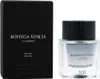 A black box and a clear glass bottle of perfume are shown against a white background. Podgląd zdjęcia produktu