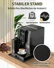 A coffee machine is placed on a black mat on a wooden countertop, with a bag of coffee beans and a cup of coffee nearby. The image includes text overlays highlighting product features. Produktbild-Vorschau