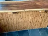 A close-up view of a wooden countertop with a bamboo slat base. Anteprima dell’immagine prodotto