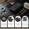 A flat lay of a wallet phone case with various accessories and currency. Produktbild-Vorschau