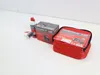 A tire repair kit with a compressor and sealant is displayed on a white surface. Produktbild-Vorschau