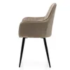 A side view of a modern, upholstered chair with black legs. Produktbild-Vorschau