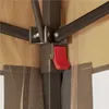 Close-up of the central mechanism of a gazebo, showing the joint where the support poles connect and a red locking lever. Produktbild-Vorschau