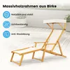 A wooden deck with a lounge chair and plants in the background. Podgląd zdjęcia produktu