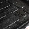 A close-up, textured view of a black car trunk liner with water droplets on it. Voir les images du produit