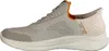 A side view of a single sneaker on a white background. Voir les images du produit