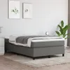A bedroom scene with a bed, two framed pictures on the wall, and a plant. Produktbild-Vorschau