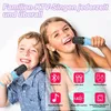 Two children are happily singing into karaoke microphones. Produktbild-Vorschau
