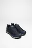 A pair of navy blue and gray hiking shoes are displayed on a white background. Produktbild-Vorschau