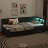 A bedroom scene with a daybed, pillows, blankets, and wall art. Podgląd zdjęcia produktu