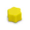 A yellow star-shaped cap on a white background. Produktbild-Vorschau