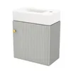 A white ceramic sink on top of a gray cabinet with a fluted design and a gold knob. Podgląd zdjęcia produktu