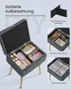 A vanity stool with its lid open, showcasing its internal storage compartments and organizational dividers. The stool is shown with various makeup and accessories inside, and smaller inset images demonstrate different storage configurations. Produktbild-Vorschau