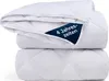 A stack of white quilted duvets. Produktbild-Vorschau