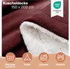 A close-up view of a dark red, plush blanket with a white sherpa lining, showing its texture and softness. Four circular icons with text are visible at the bottom, illustrating usage scenarios. Podgląd zdjęcia produktu