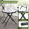 A round folding table with a mosaic-like top, placed indoors next to a sofa. The image also includes close-up shots of the table's construction. Podgląd zdjęcia produktu