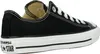 A black Converse sneaker is shown from the side against a white background. Voir les images du produit