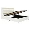 A white upholstered bed frame with the storage compartment open, showing the slatted base. Produktbild-Vorschau