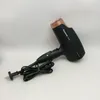 A black Panasonic hair dryer with rose gold accents is placed on a white background. Podgląd zdjęcia produktu