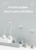 Three neck fans in different colors are displayed on a minimalist, tiered platform against a light gray background, showcasing color options. Náhľad obrázku produktu