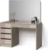 A vanity table with a large mirror and drawers, decorated with vases and perfume bottles. Voir les images du produit