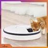 A puppy eating from an automatic pet feeder. Anteprima dell’immagine prodotto