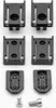 A set of black plastic connectors and screws for a modular storage system, laid out on a white background. Anteprima dell’immagine prodotto